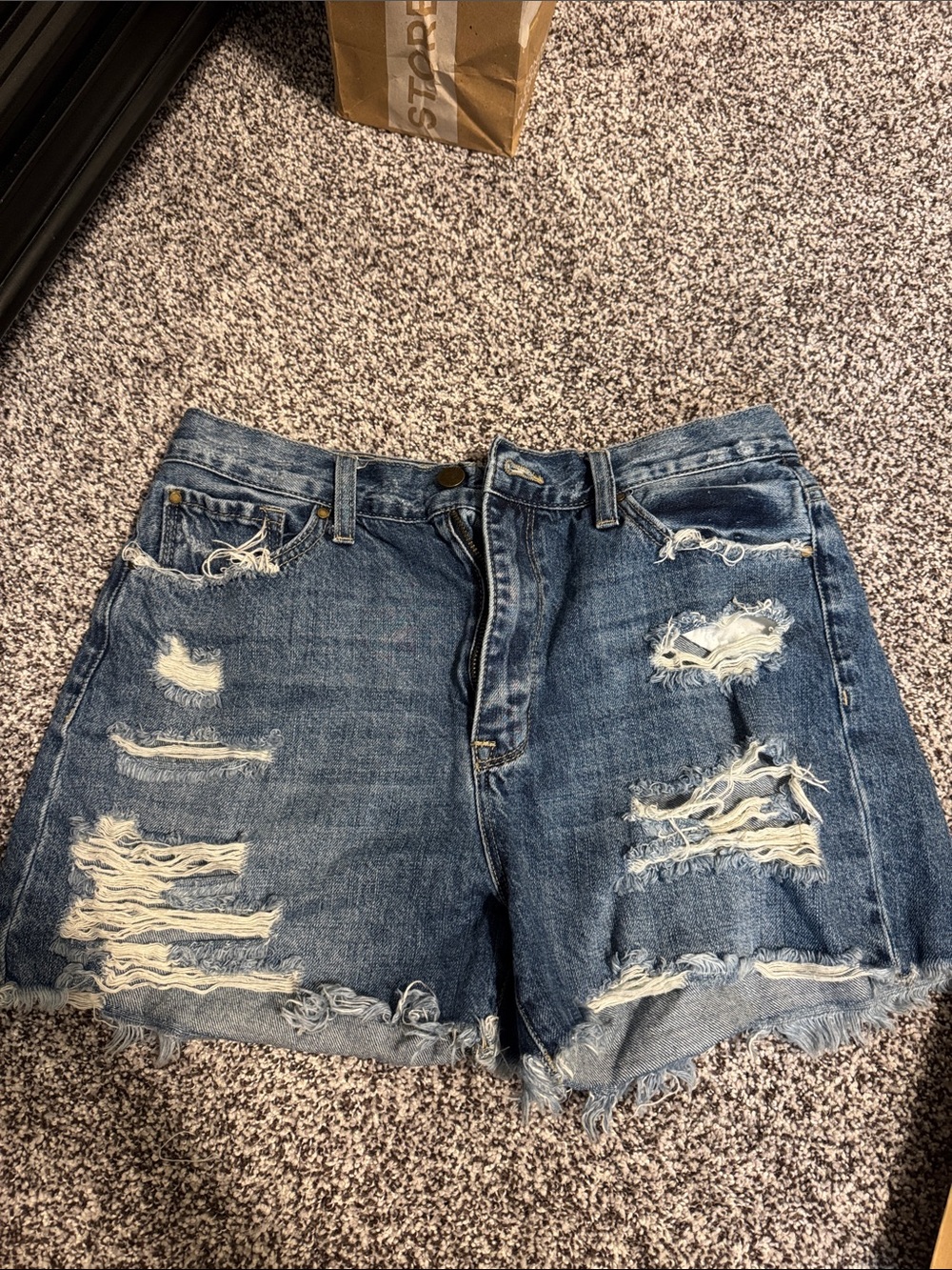 High-Rise Distressed Denim Shorts in Blue